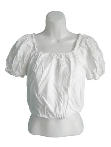 Haut blanc à manches bouffantes et col carré