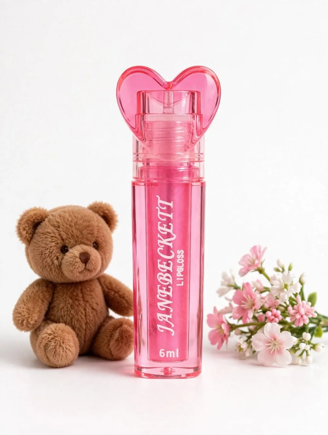 Gloss à lèvres rose avec bouchon cœur