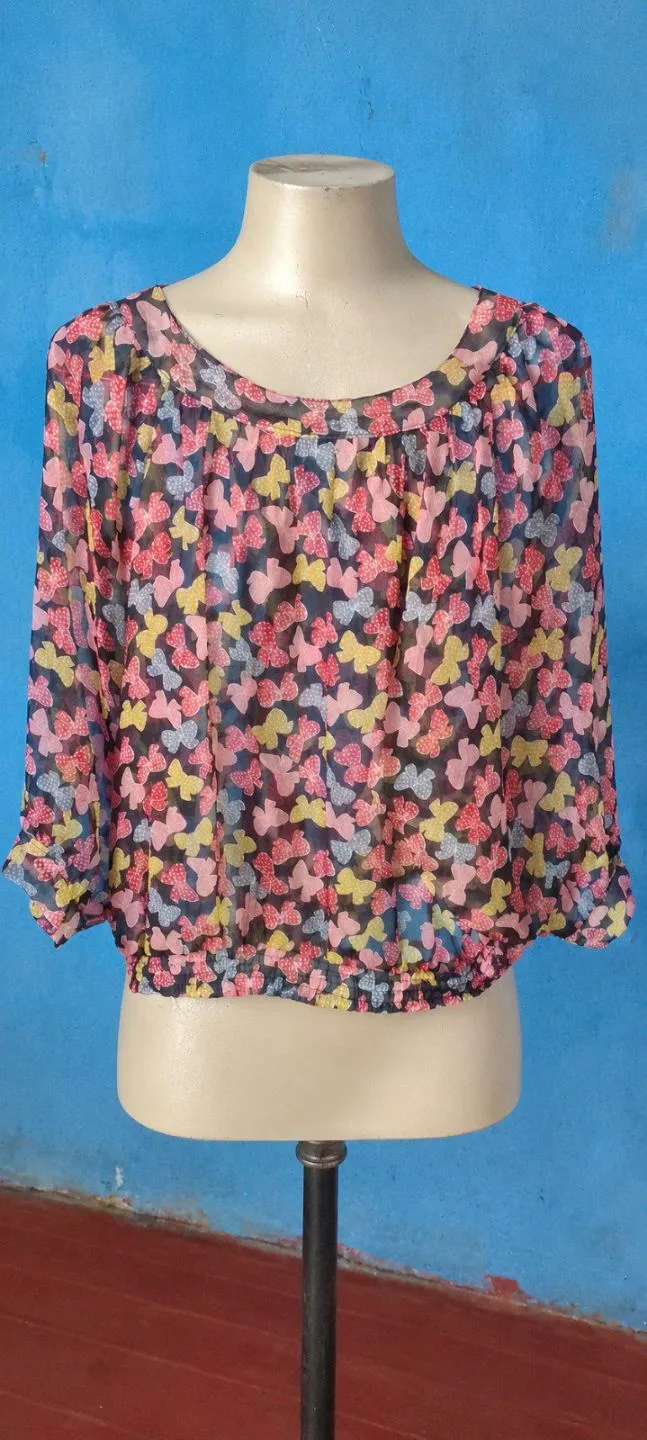Blouse à manches trois quarts à motifs fleuris